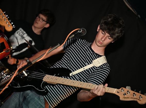 James Kelly on bass with James Lister behind him