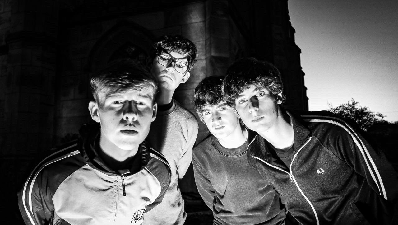 Black and white flash portrait of The Fleecers